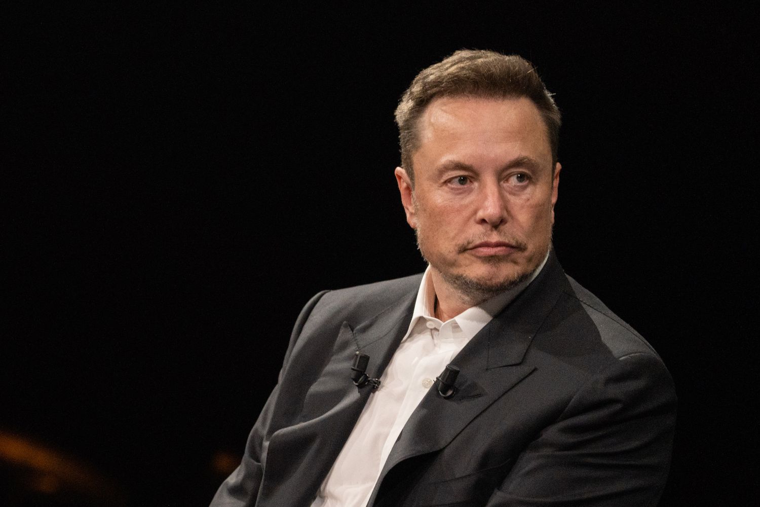 Elon Musk Threatens to Ban Apple Devices Over OpenAI Integration, Citing Security Concerns Image